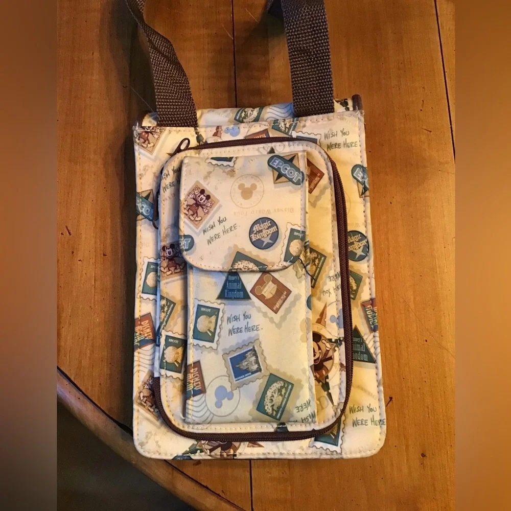 Gently used Disney Crossbody Bag with many great pockets (Purchased in P…